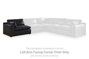 Ashley Furniture Emilia sectional sofa in a spacious L-shaped design with plush seating and neutral upholstery