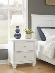 Ashley Furniture Fortman bedroom set with bed, dresser, mirror, and nightstand in rustic brown finish