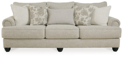 Ashley Furniture Asanti sofa with plush cushions and fabric upholstery, shown from a head-on view.