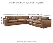 Ashley Furniture Emilia sectional sofa with plush cushions and chaise in a neutral fabric.