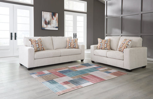 Ashley Furniture Aviemore living room set with sofa, loveseat, and armchair in a cozy, modern design.
