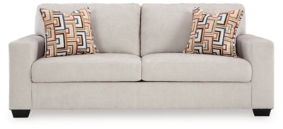 Ashley Furniture Aviemore sofa with plush cushions and neutral fabric, shown from a head-on angle.