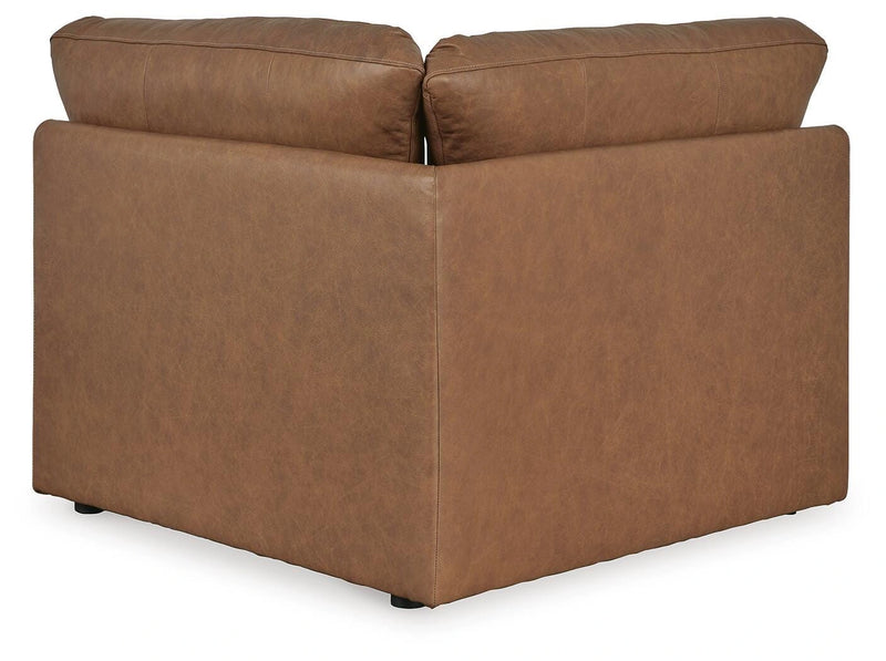 Ashley Furniture Emilia sectional sofa in a neutral fabric with chaise lounge seating
