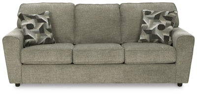 Ashley Furniture Cascilla sofa with plush cushions and neutral fabric, shown from a head-on view highlighting its inviting design.