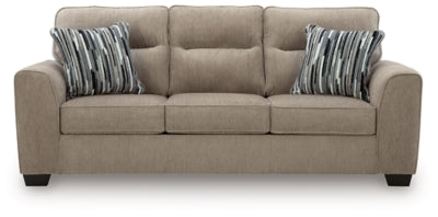 Ashley Furniture Olten Sofa with plush cushions and contemporary design, shown in a head-on view.