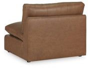 Ashley Furniture Emilia sectional sofa in a neutral fabric with chaise lounge and plush cushions