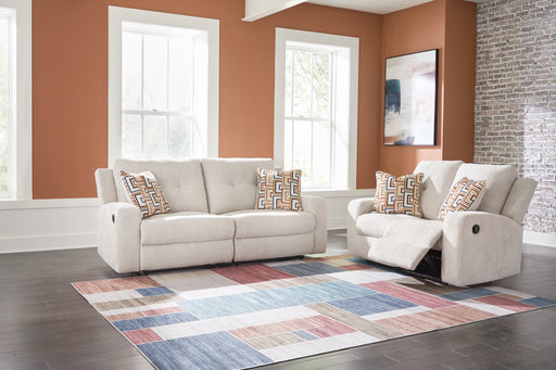 Ashley Furniture Danum upholstery living room set with a sofa and chairs in a modern design, shown in a stylish living space.