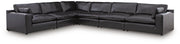 Ashley Furniture Emilia sectional sofa in a neutral fabric with chaise lounge and plush cushions