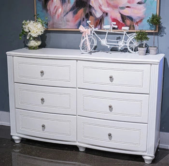 Ashley Furniture Kozlani dresser and mirror in a weathered finish with six drawers and decorative hardware