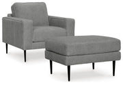 Ashley Furniture Hazela living room set with sofa, loveseat, and armchair in a modern design, featuring neutral fabric upholstery.