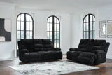 Ashley Furniture Rhine Falls living room set with power reclining sofa and loveseat featuring a drop-down table in a modern design.