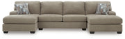 Ashley Furniture Newellen sectional with double chaise, featuring plush upholstery and modern design in a stylish living room setting.