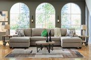 Ashley Furniture Newellen sectional with chaise, featuring plush upholstery and modern design, shown in a stylish living room setting.