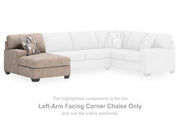 Ashley Furniture Newellen sectional with chaise, fabric sofa featuring plush cushions and a modern design in a cozy living room setting