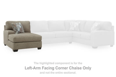 Ashley Furniture Newellen sectional with double chaise, shown in a modern living room setting, featuring plush fabric upholstery and spacious seating.