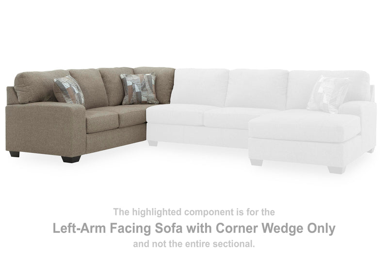 Ashley Furniture Newellen sleeper sectional with chaise, showing plush fabric upholstery and modern design in a living room setting.