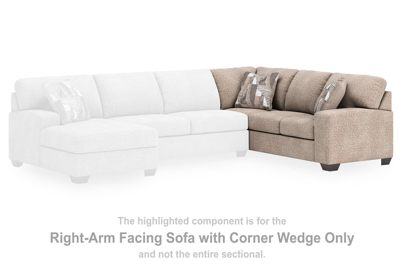 Ashley Furniture Newellen Sleeper Sectional with Chaise, beige fabric, modern design, featuring plush cushions and a built-in sleeper sofa.