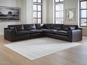 Ashley Furniture Emilia sectional sofa in a neutral fabric upholstery, three-quarter view