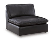 Ashley Furniture Emilia sectional sofa in a neutral fabric with chaise lounge seating