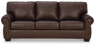Ashley Furniture Colleton sofa with plush cushions and neutral fabric, shown from a head-on angle.