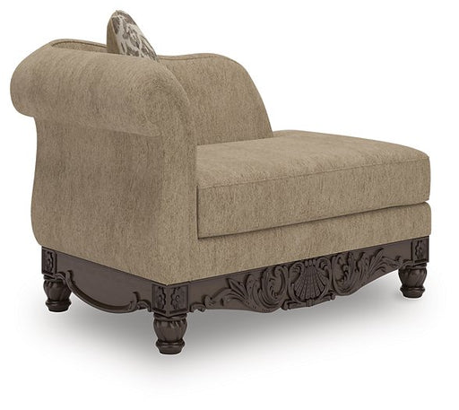 Ashley Furniture Chelsworth right-arm facing corner chaise chair with plush cushions and wooden legs, shown from an angled view.