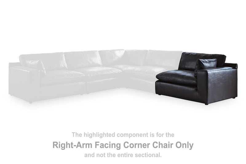 Ashley Furniture Emilia sectional sofa in a contemporary design with plush cushions and spacious seating