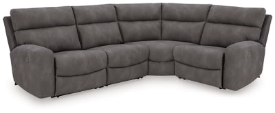 Ashley Furniture Next-Gen DuraPella power reclining sectional with plush cushions and modern design in a neutral fabric.