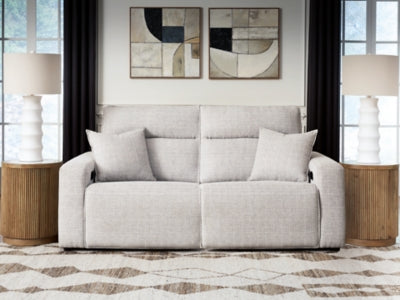 Ashley Furniture Modmax II reclining sectional loveseat in dark gray fabric with plush cushions and built-in recliners.