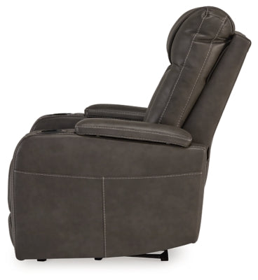 Ashley Furniture Feazada power recliner showing plush fabric, padded armrests, and built-in recline mechanism in a modern living room setting.