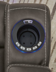 Ashley Furniture Feazada power recliner with built-in USB port, featuring plush cushioning and a sleek design for comfortable seating.