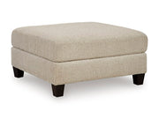 Ashley Furniture Steelwater Retreat oversized accent ottoman with plush fabric and stylish design, shown from an angled view.