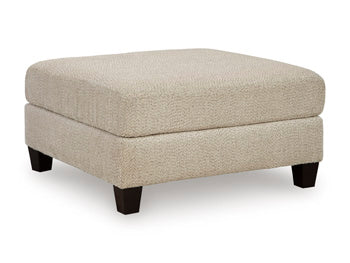 Ashley Furniture Steelwater Retreat oversized accent ottoman with plush fabric and stylish design, shown from an angled view.