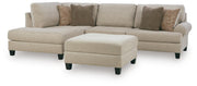 Ashley Steelwater Retreat living room set with sofa and armchair in a modern, stylish design featuring neutral upholstery and wooden accents.