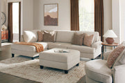 Ashley Furniture Steelwater Retreat living room set with sofa and armchair, featuring neutral upholstery and modern design.