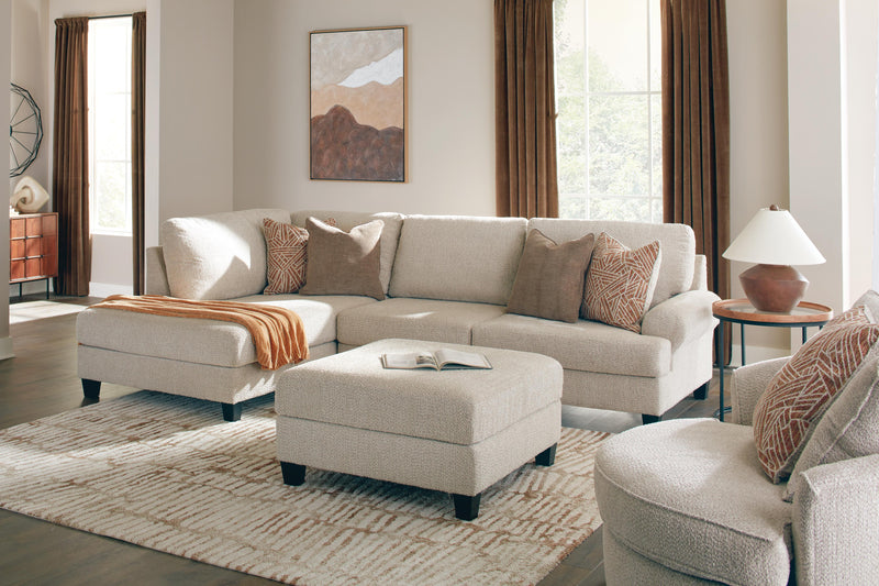 Ashley Furniture Steelwater Retreat living room set with sofa and armchair, featuring neutral upholstery and modern design.