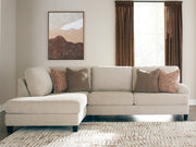 Ashley Furniture Steelwater Retreat sectional with chaise, featuring plush cushions and modern design, shown in a cozy living room setting.