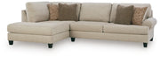 Ashley Furniture Steelwater Retreat sectional with chaise, showing plush fabric upholstery and modern design in a spacious living room setting.