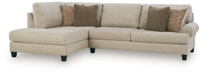 Ashley Furniture Steelwater Retreat sectional with chaise, showing plush fabric upholstery and modern design in a spacious living room setting.