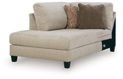 Ashley Furniture Steelwater Retreat sectional with chaise, showing a modern fabric sofa with plush cushions and angled view.