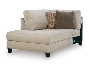 Ashley Furniture Steelwater Retreat sectional with chaise, showing plush fabric upholstery and modern design in an angled view.