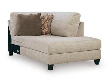 Ashley Furniture Steelwater Retreat sectional with chaise, showing a stylish fabric sofa with chaise lounge and angled view.