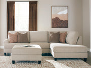 Ashley Furniture Steelwater Retreat living room set with plush sofa and armchair, featuring neutral upholstery and contemporary design.