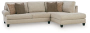Ashley Furniture Steelwater Retreat sectional with chaise, showing plush gray upholstery and modern design in a living room setting.