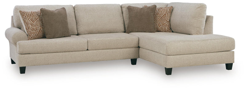 Steelwater Retreat living room set by Ashley Furniture with plush sofas and matching armchairs in a modern design.