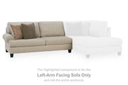 Ashley Furniture Steelwater Retreat sectional with chaise, featuring plush cushions and a modern design in a cozy living room setting.