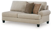 Ashley Furniture Steelwater Retreat sectional with chaise showing plush fabric upholstery and modern design from an angled view.