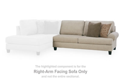 Ashley Furniture Steelwater Retreat sectional with chaise, featuring plush upholstery and modern design, shown from a front view.