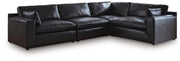 Ashley Furniture Emilia sectional sofa in a neutral fabric with spacious seating and plush cushions