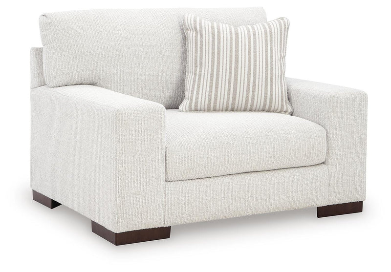 Ashley Furniture Hartside oversized chair with plush upholstery and wide armrests, viewed from an angled side perspective.
