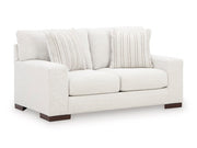 Ashley Furniture Hartside Loveseat with plush fabric and cushioned armrests, shown from an angled view in the image.